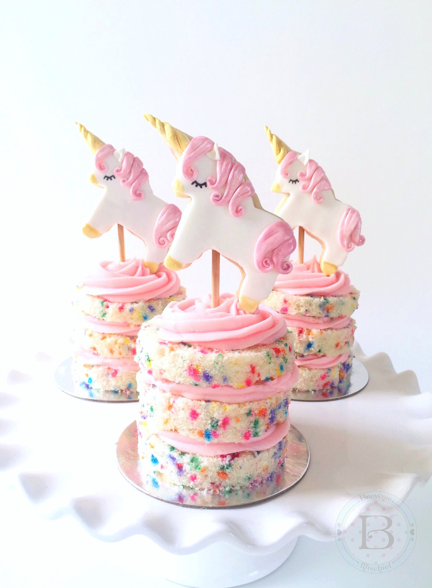 Mini Confetti Cakes with Unicorn Cookie Toppers by Brownie Mischief