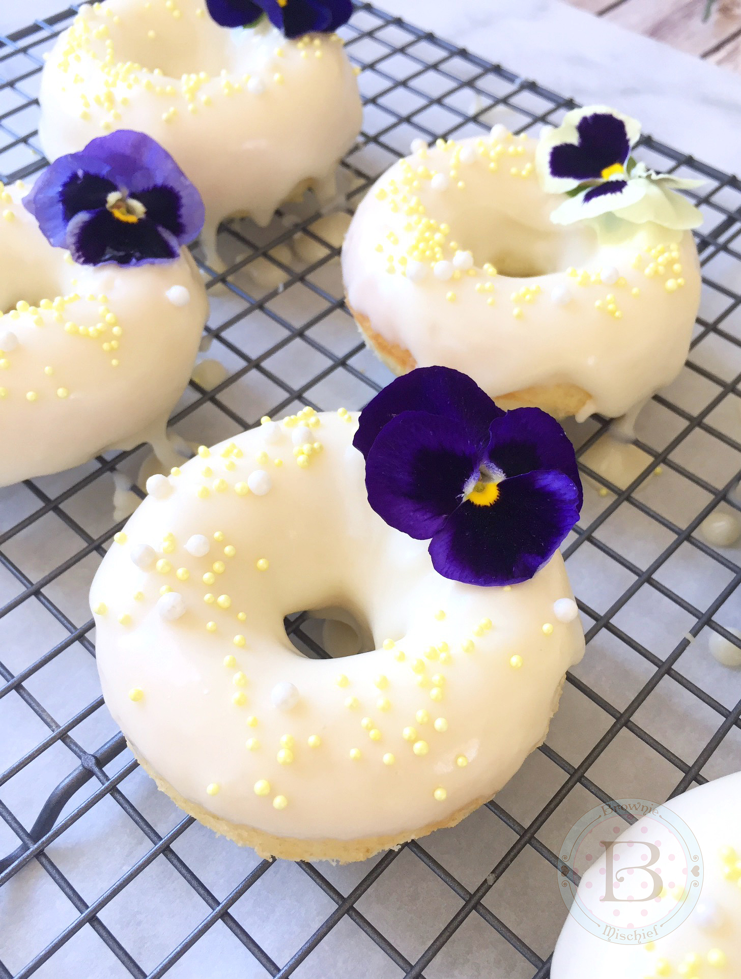 Lemon Buttermilk Donuts with Honey Cream Cheese Icing by Brownie Mischief