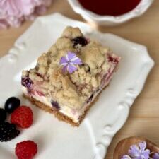 Triple Berry Crumble Cheesecake Bars